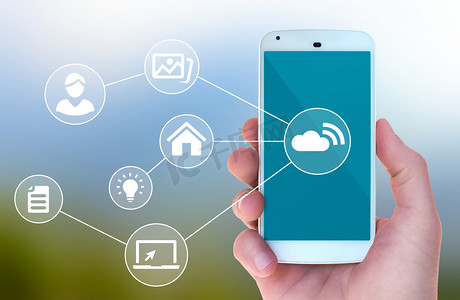 手机网络信号摄影照片_Modern mobile smart phone connected to wireless automation apps 
