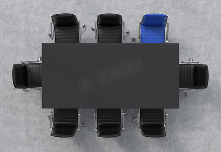 原件摄影照片_Top View of a conference room. A black rectangular table and eight chairs around, one of them is blue. Office interior. 3D rendering.