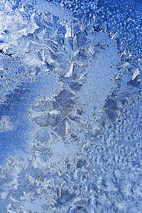 冬季窗户摄影照片_窗户上的霜图案
