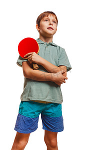 坪摄影照片_打乒乓球的白肤金发的男孩反手的坪乒乓球男子拿顶