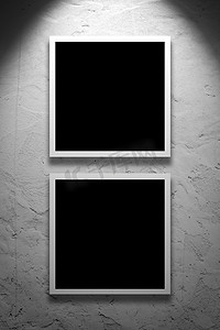 活动海报摄影摄影照片_艺术画廊的墙上挂着的两个方形画