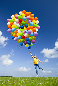 开心一家摄影照片_与气球跳