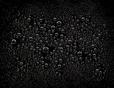 表面水珠摄影照片_黑色背景上的水滴