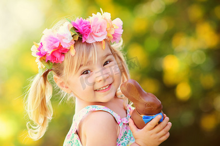 cute easter girl with chocolate bunny
