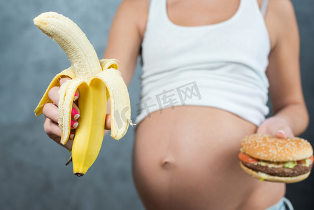 Close up of a cute pregnant belly tummy and healthy not healthy 