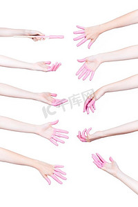 设置人的手与粉红色油漆白色背景