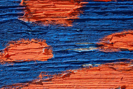 老的蓝色和橙色画的木木板纹理关闭背景。彩绘木材纹理
