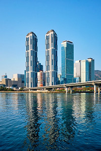 广安桥摄影照片_釜山市摩天大楼和光岸大桥，韩国。釜山摩天大楼和光岸大桥，韩国