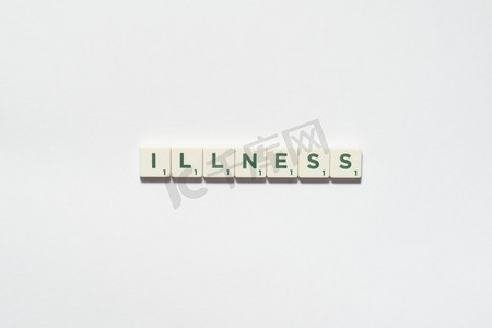 疾病字形成的拼字块白色背景。危险疾病和身体健康意识。由拼字障碍形成的疾病。