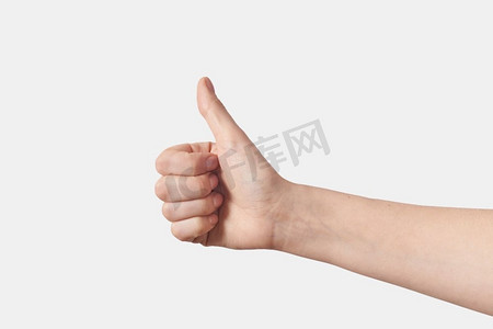 好的手势摄影照片_女性竖起大拇指的手势或白色背景下孤立的表决权..竖起大拇指，在白色上做手势。