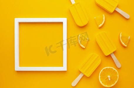 食品背景黄色摄影照片_黄色冰淇淋框架