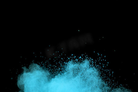粒子爆炸摄影照片_飞扬的蓝色尘埃粒子