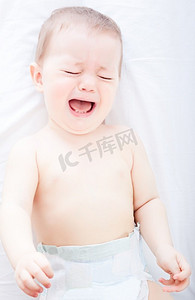不悦摄影照片_哭泣的婴儿肖像 