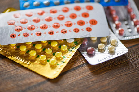 避孕药避孕药避孕观节育木质背景/保健和药物-口服避孕药