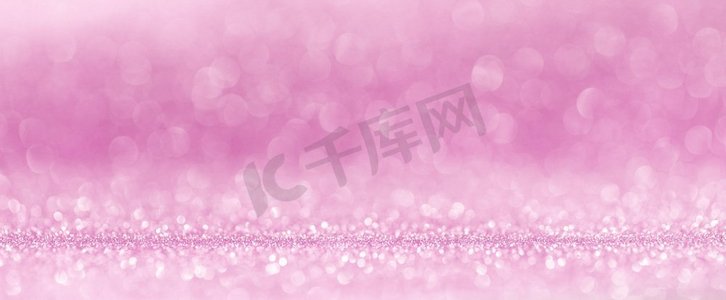 闪亮的粉红色散景闪光灯抽象背景，情人节聚会庆祝概念。’闪亮的粉红色灯光背景