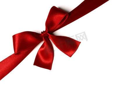 白色背景上孤立的红色礼物蝴蝶结。白色上的红色礼物蝴蝶结