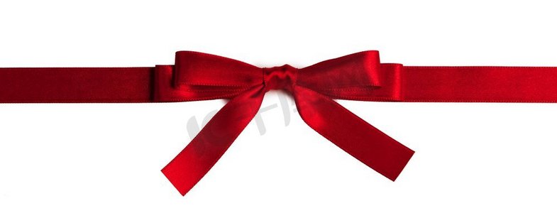 白色背景上孤立的红色礼物蝴蝶结。白色上的红色礼物蝴蝶结