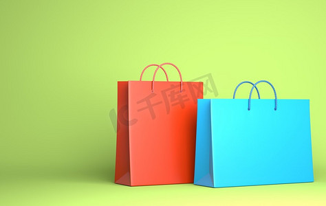 商品插图摄影照片_两个空的购物袋在绿色。3D插图。绿色上的两个空购物袋