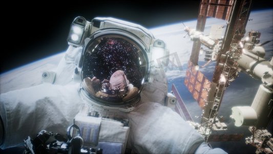 宇航员美国摄影照片_宇航员在太空行走。美国国家航空航天局提供的这张图片的要素