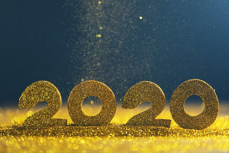 2020新年奢华设计理念。金色2020新年水平模板与金色闪光在蓝色背景。2020新年豪华设计