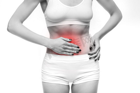 身体疼痛摄影照片_胃痛，妇女有问题在月经期间，白色背景。内衣、医疗广告或概念中的女性