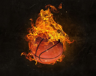 游戏火焰摄影照片_黑暗背景下的火球火焰。混合媒体。篮球比赛概念