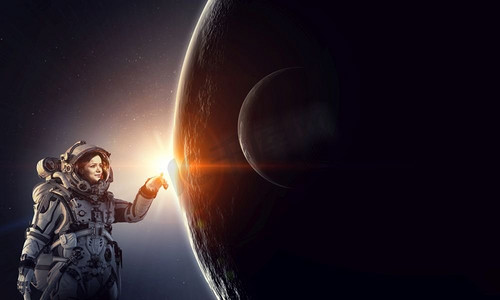 外太空地球摄影照片_女宇航员在太空触摸星球。这张照片由NASA提供。探索外太空。混合媒体