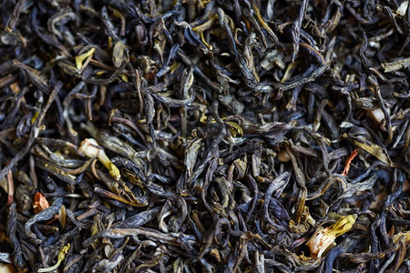 中国干茶背景，茉莉花茶干冲泡茶，叶红茶