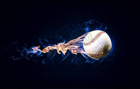棒球比赛的概念，球在火焰中。混合媒体。球在火中燃烧