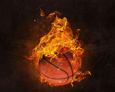 球在火火焰在黑暗背景。混合媒体。篮球运动概念