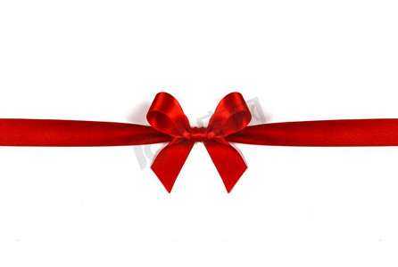 红绸缎摄影照片_白色背景上孤立的红色大绸缎蝴蝶结。圣诞礼物的概念。白底红蝴蝶结
