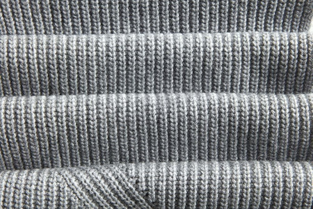 天然保暖针织灰色面料与织物褶皱。天然保暖针织坯布