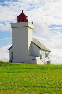 路灯塔摄影照片_滨海风光。挪威南部的奥布雷斯塔德灯塔，挪威国家旅游县路44号，杰伦。挪威的奥布雷斯塔德灯塔。