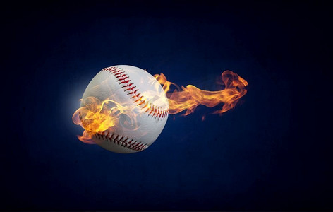 游戏火焰摄影照片_棒球游戏的概念与球在火焰。混合媒体。球在火中燃烧