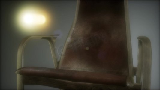 国潮风格牛摄影照片_老风格的棕色复古扶手椅在黑暗中。老风格棕色复古扶手椅