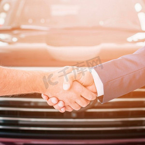经销商摄影照片_握手汽车经销商高分辨率照片。握手汽车经销商高品质的照片