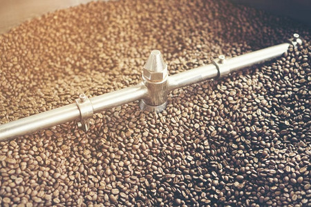 咖啡豆纹理摄影照片_烘焙咖啡豆，可以作为背景