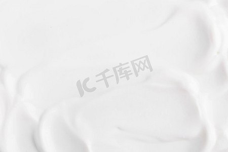 面部照片摄影照片_顶视贴白色天然酸奶。高分辨率照片。顶视贴白色天然酸奶。高质量照片