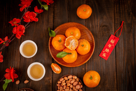 新年美食橘子复古木桌摆放