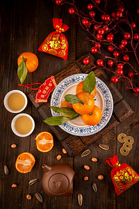 新年春节美食橘子中式木桌摆放