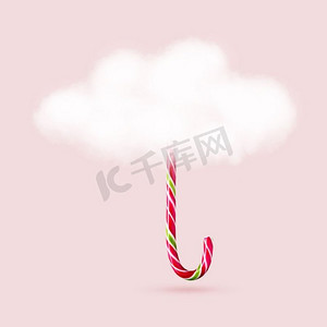 云和长圣诞糖果在粉红色的背景。云伞和长圣诞糖果