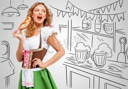 年轻性感的啤酒节女人穿着传统的巴伐利亚连衣裙，在简陋的酒吧柜台上吃着椒盐卷饼。