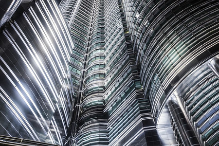 马来西亚国家石油公司大厦的摩天大楼背景。马来西亚吉隆坡马来西亚国家石油公司双子塔摩天大楼抽象背景