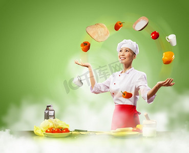 杂耍女厨师杂耍女亚洲厨师反对颜色背景