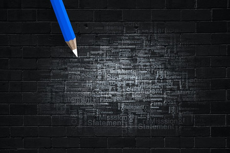商业关键字。用铅笔在墙上写下的商业概念词