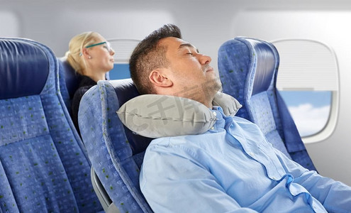 睡觉的枕头摄影照片_飞机、睡觉、枕头、飞行