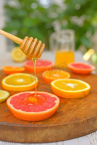 葡萄柚片，柑橘，橙子和蜂蜜
