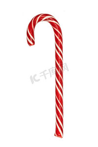 圣诞白色背景摄影照片_圣诞节红色条纹糖果甘蔗孤立在白色背景。圣诞糖果甘蔗孤立在白色