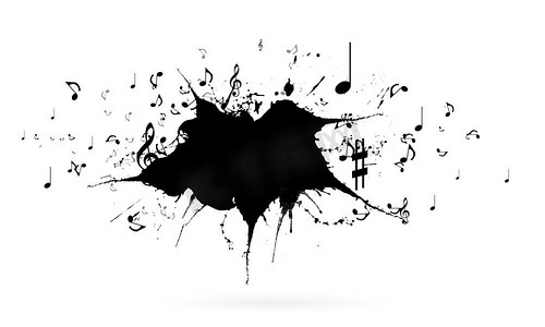 装饰音乐符号摄影照片_音乐概念。白色背景上带有黑色音乐标志的概念图像