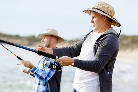 渔夫的照片渔民用鱼竿捕鱼的图片